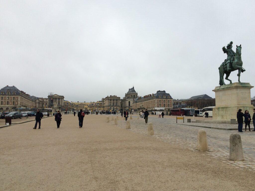 Versailles France | Krista the Explorer Walkway up to Versailles with statue.