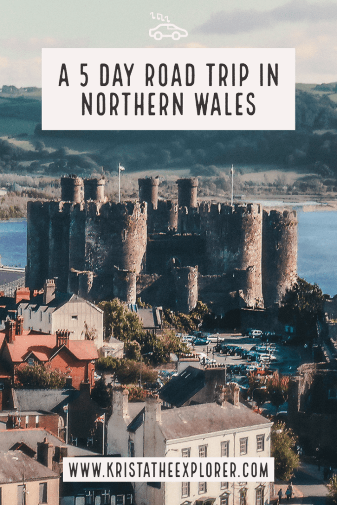 Large castle along river in Wales.