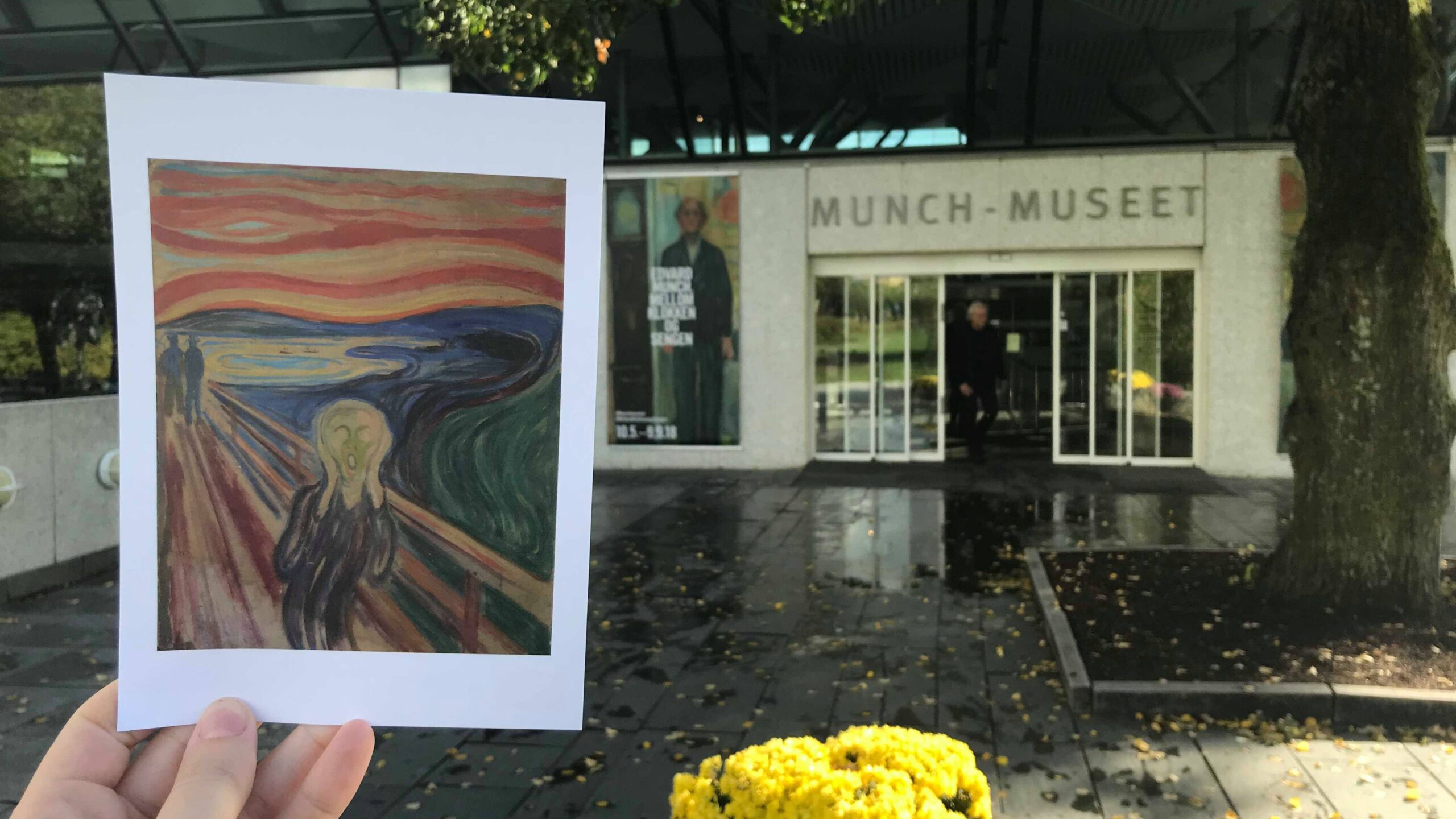 The Scream postcard in front of museum in Oslo.