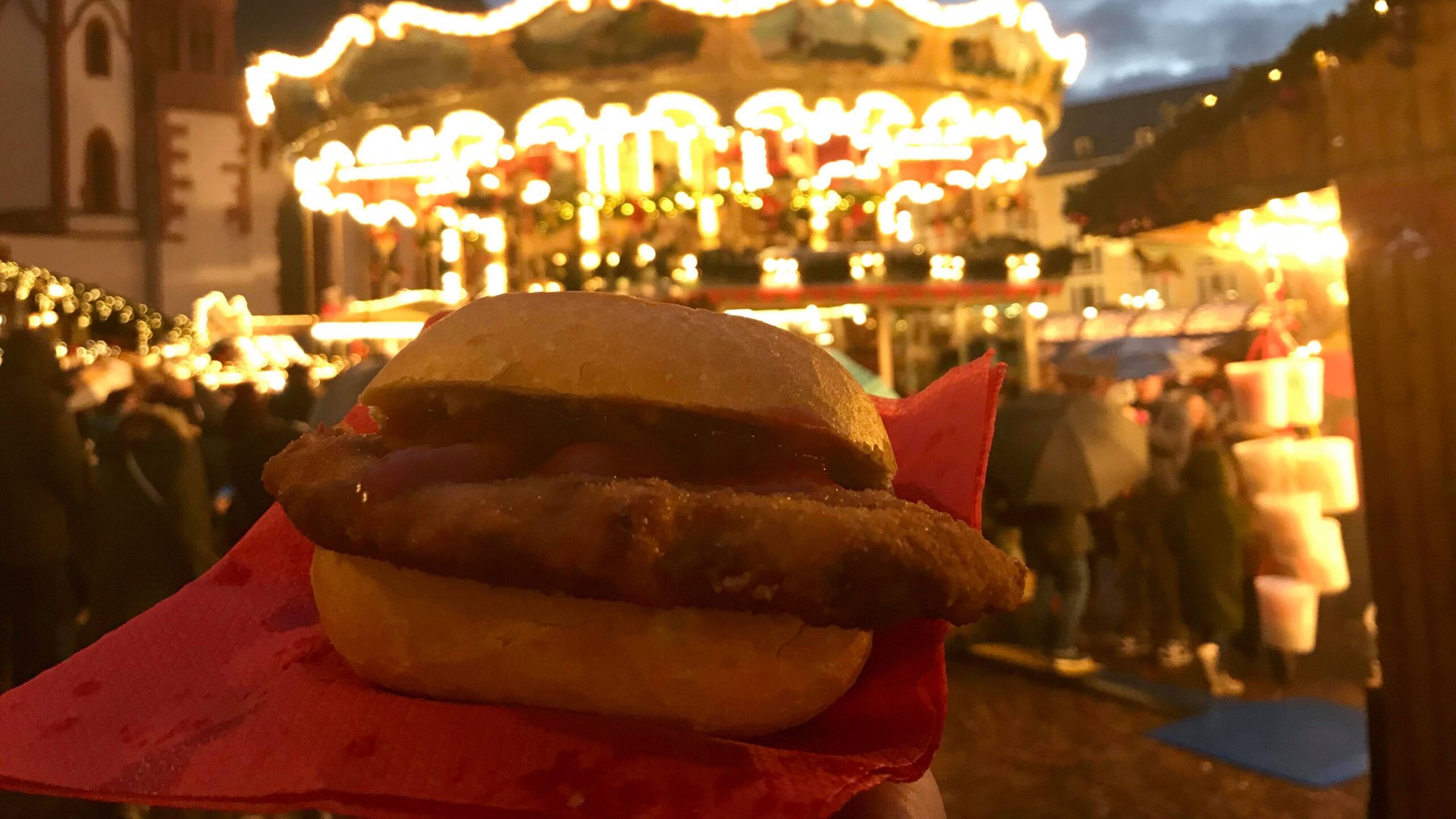 Schnitzel on a bun at Christmas market.