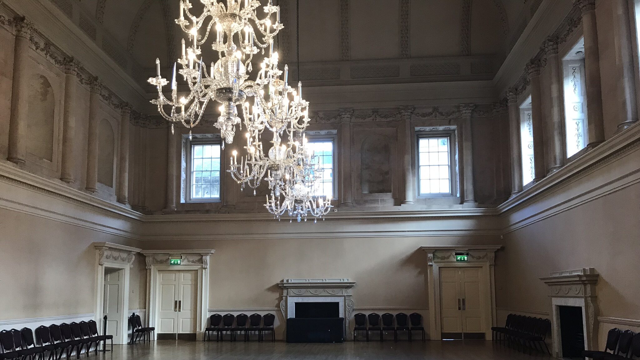 Large dancing hall with chandelier in Bath.