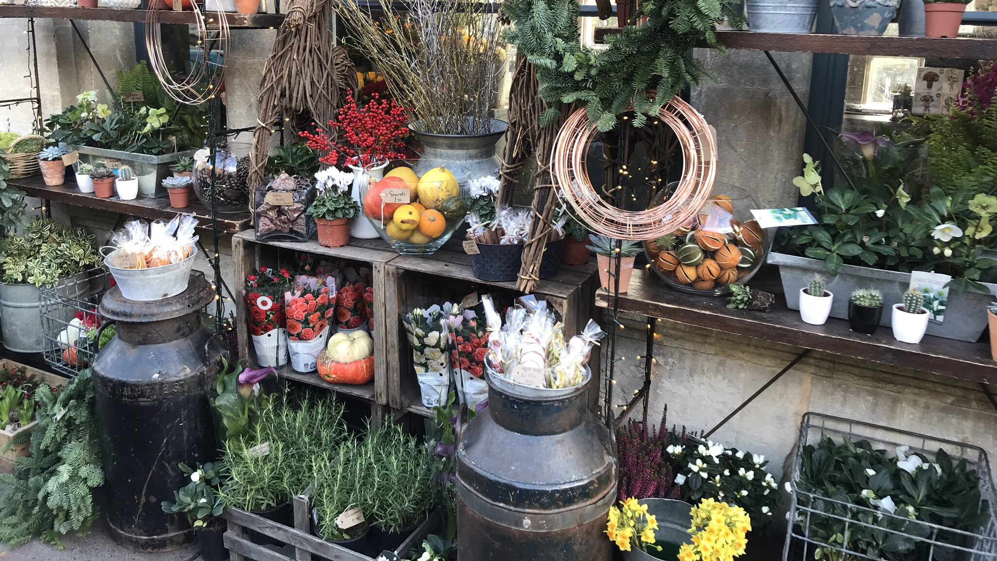 Flower shop in Bath with outdoor display.