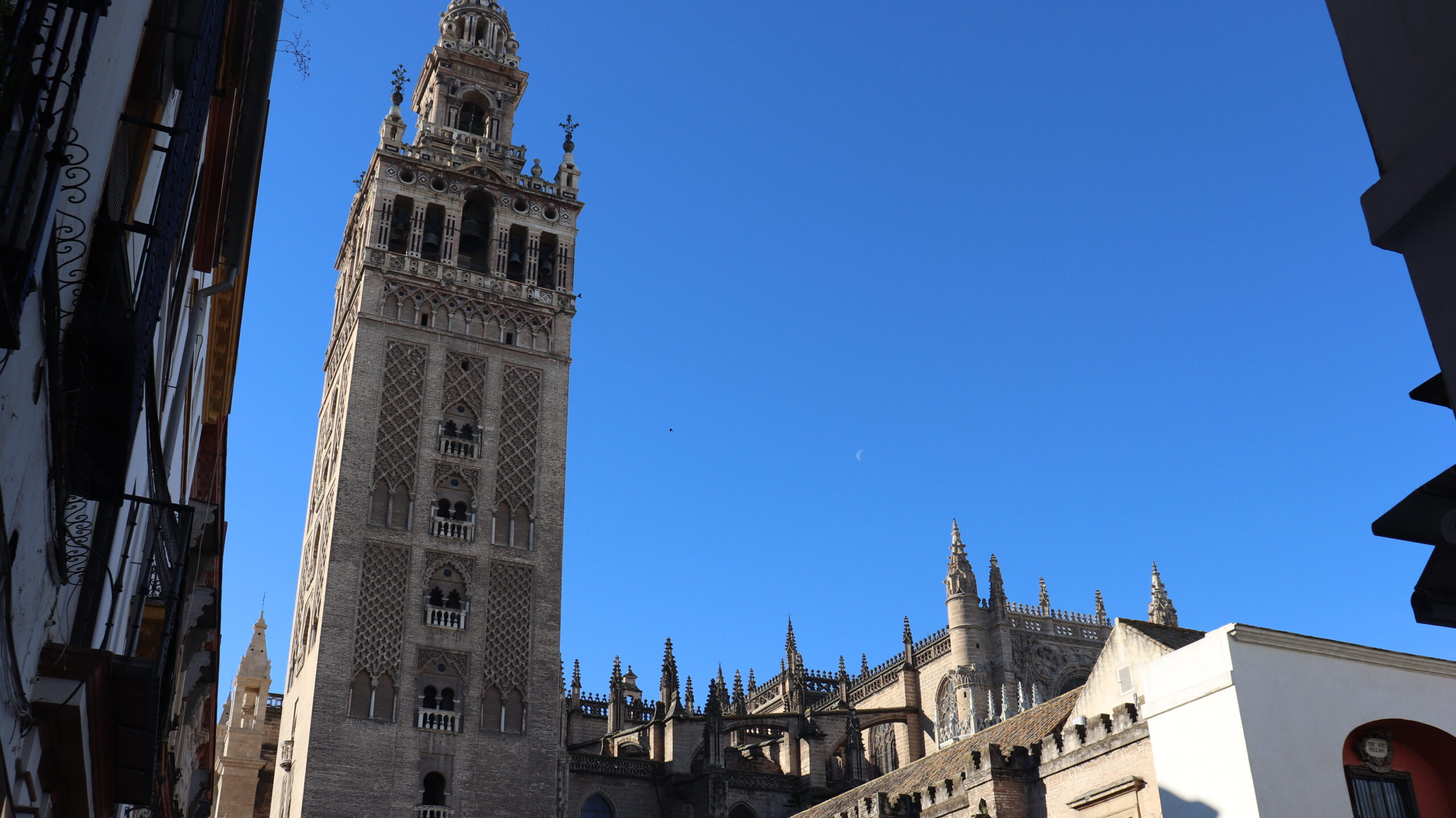 Main tower of Seville Cathedral from street level.