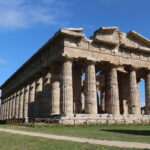 Ancient Greek ruins in town in Italy.