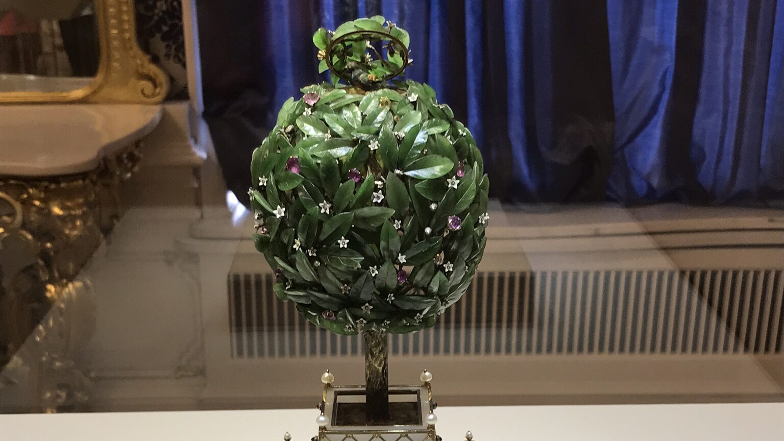 Beautiful Faberge egg in the shape of a tree.