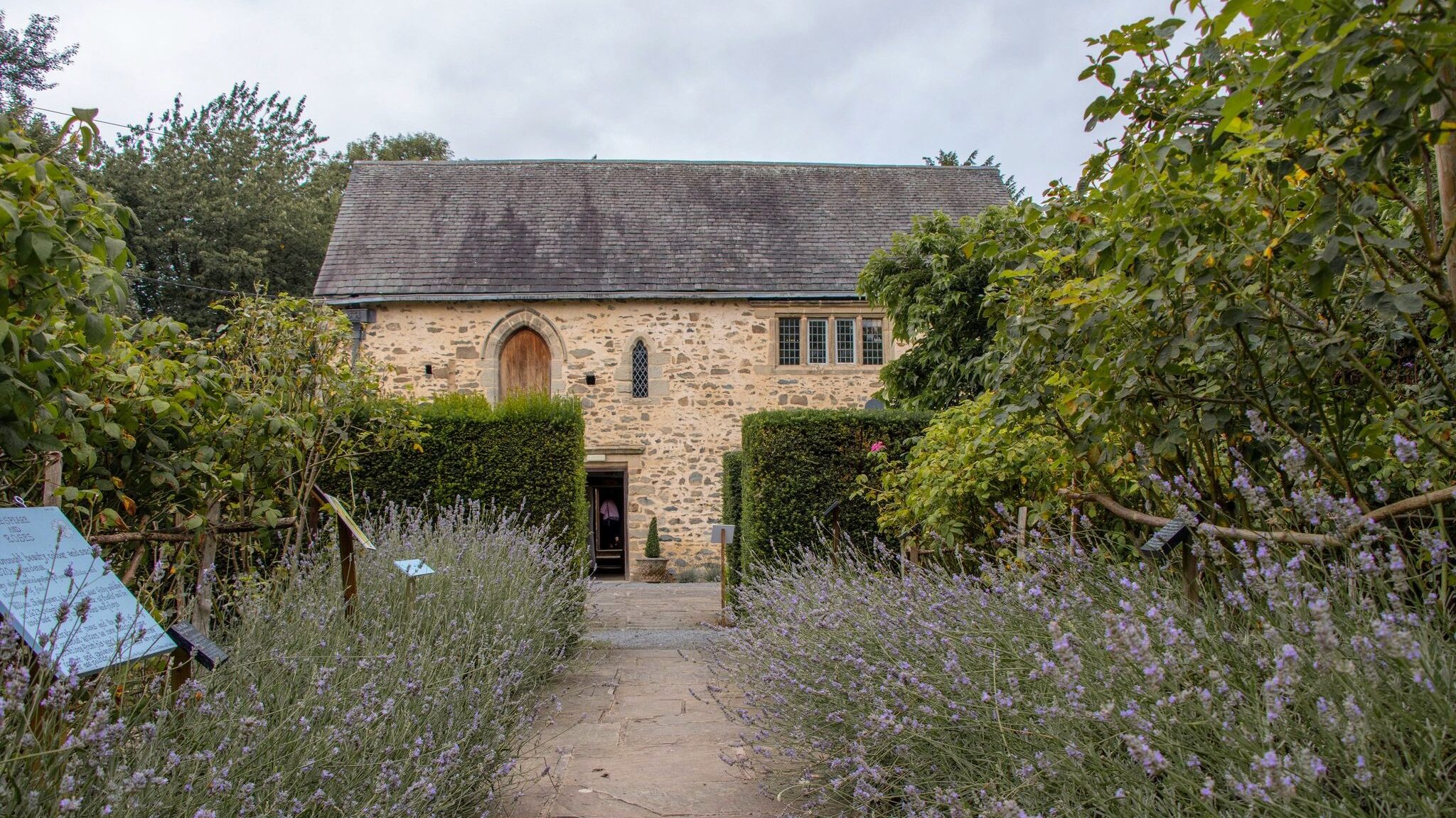 Path leading up to small country cottage.