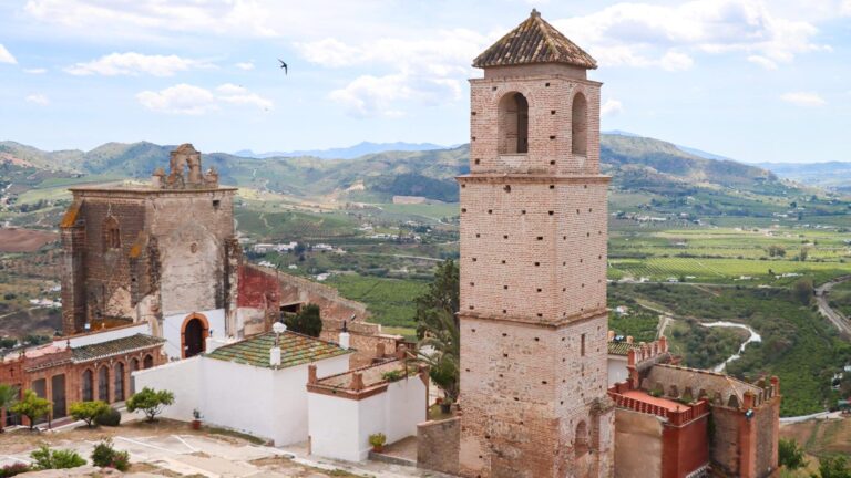 View of castle tower in white village.