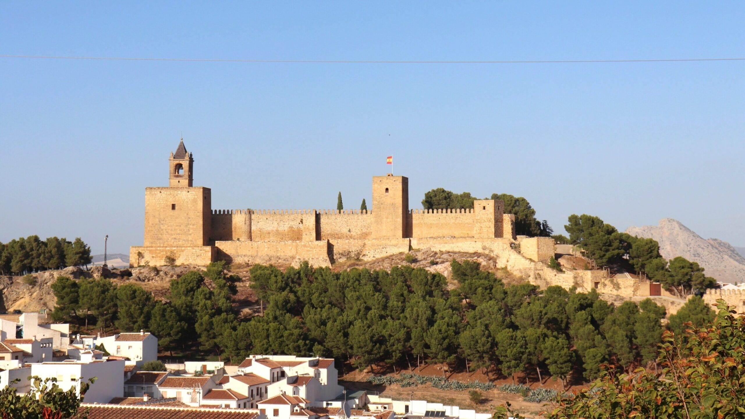 Large medieval castle in historic village.