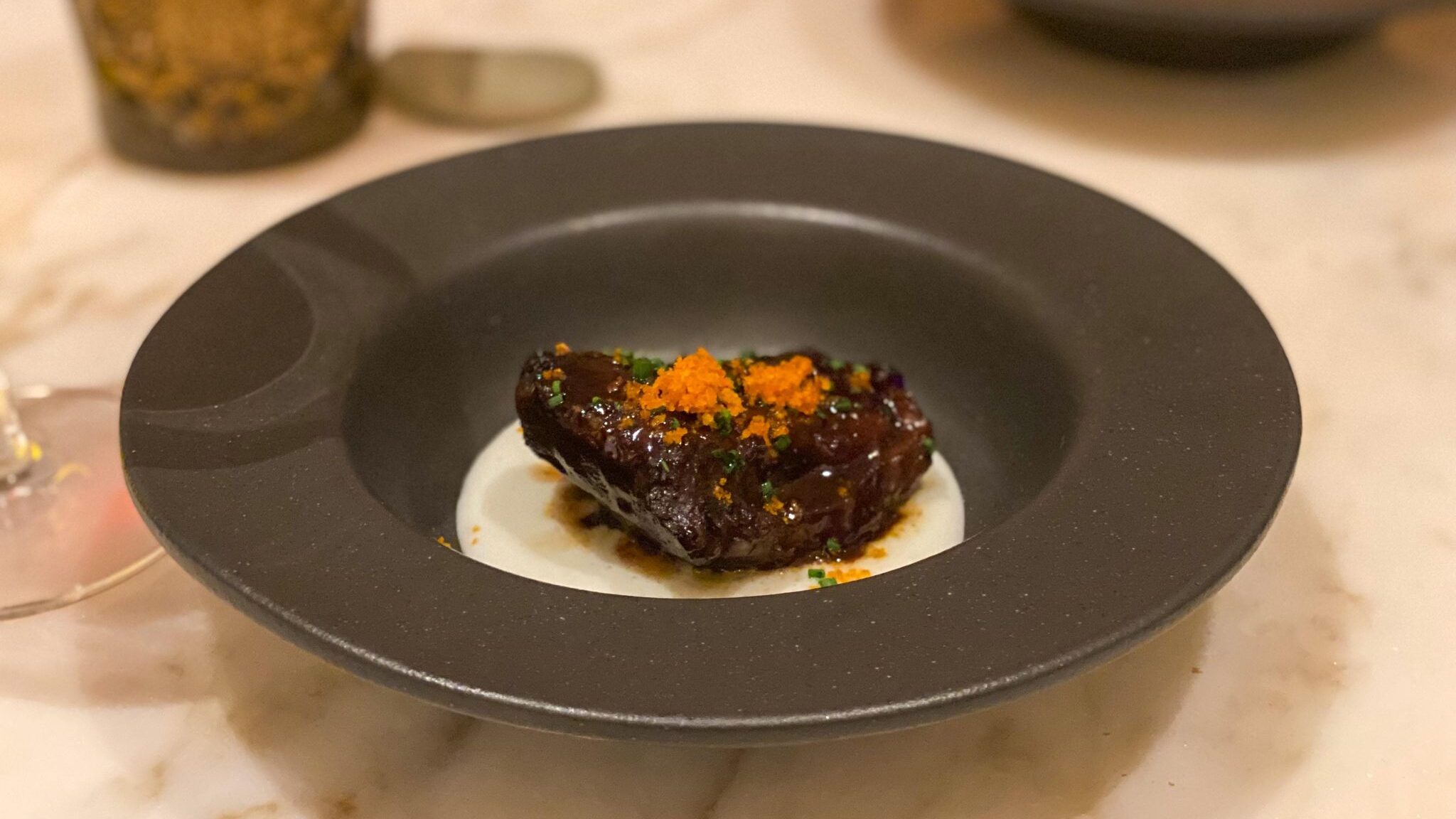 Black bowl served in restaurant in Tarifa.