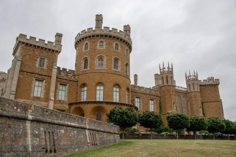 Large castle with round tower near Leicester.