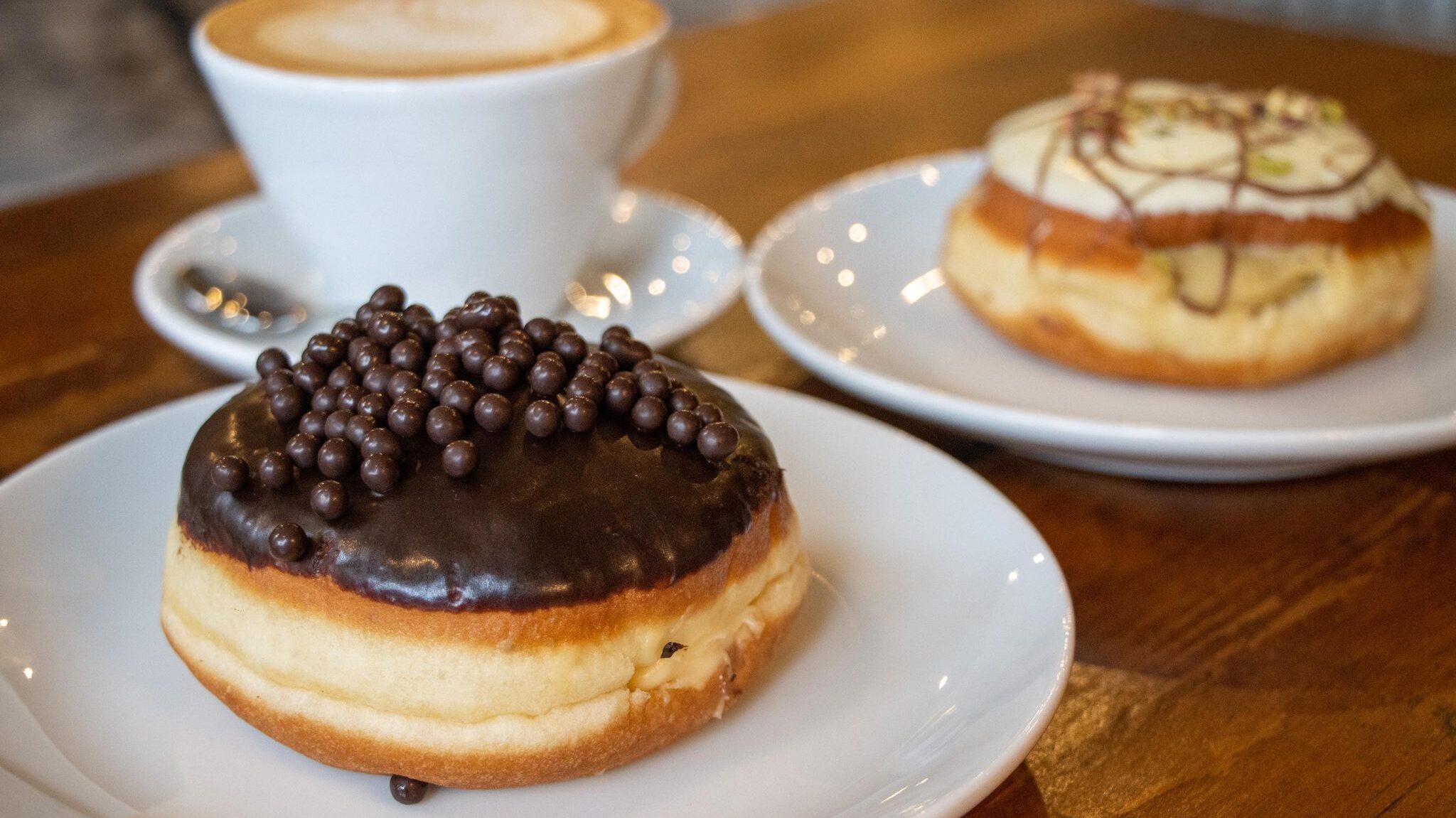 Two large doughnuts and a coffee.