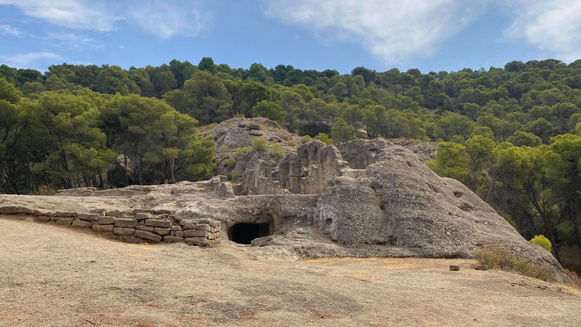 Ruins of historic village in mountains.