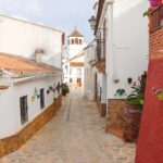 Whitewashed street leading to main plaza.