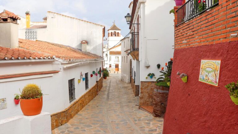 Whitewashed street leading to main plaza.