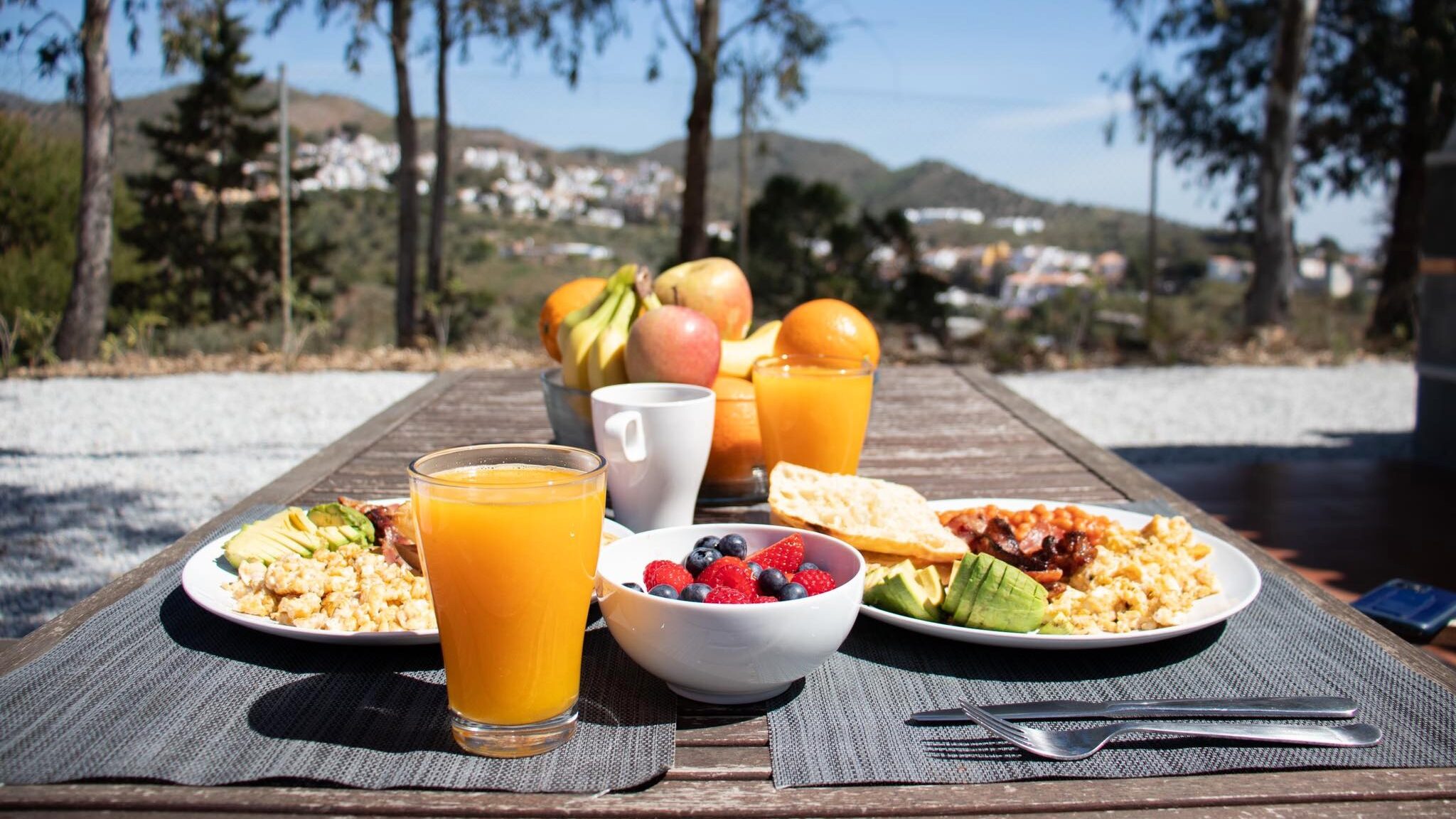 Breakfast set up on table outside house in Chilches.