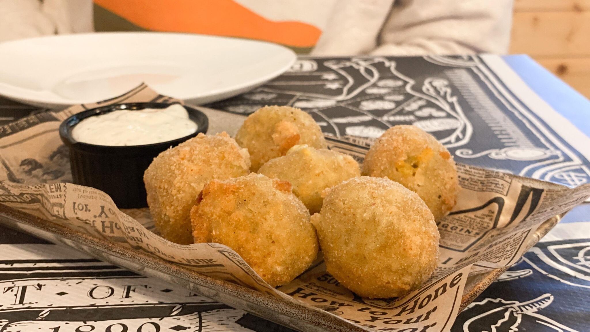 Small arancini balls with dip.