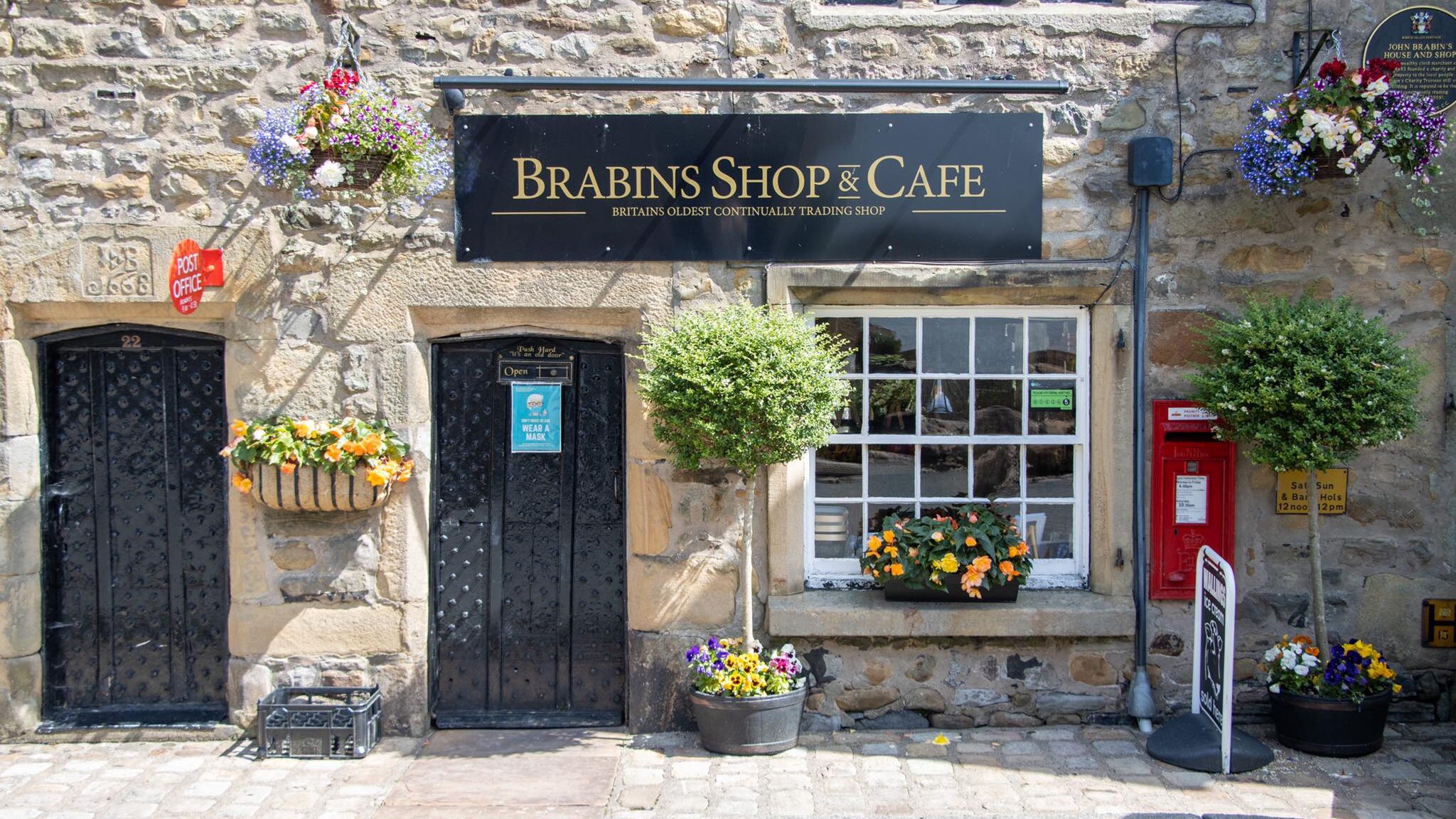 Entrance to cafe in old village in England.