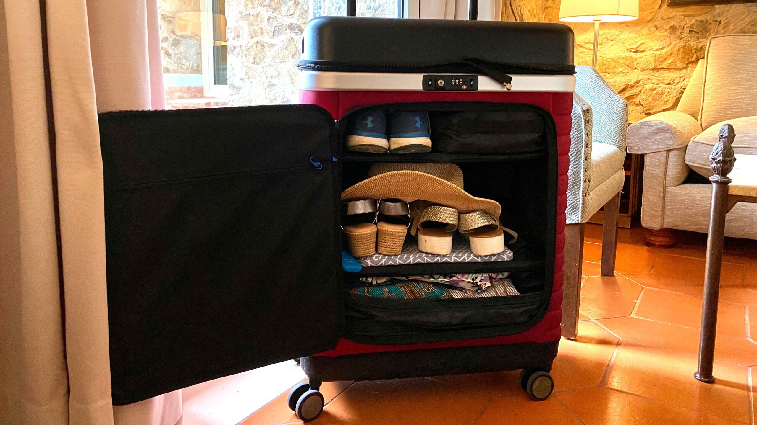 Condensed suitcase with shelves inside.