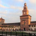 Inner courtyard of Sforza Castle at sunset.