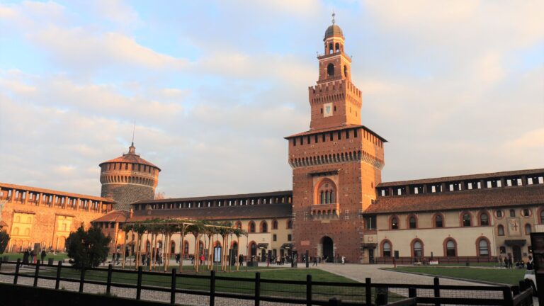 Inner courtyard of Sforza Castle at sunset.