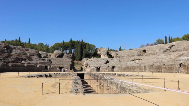 Ancient roman ruins of an amphitheatre during day trips from Seville.