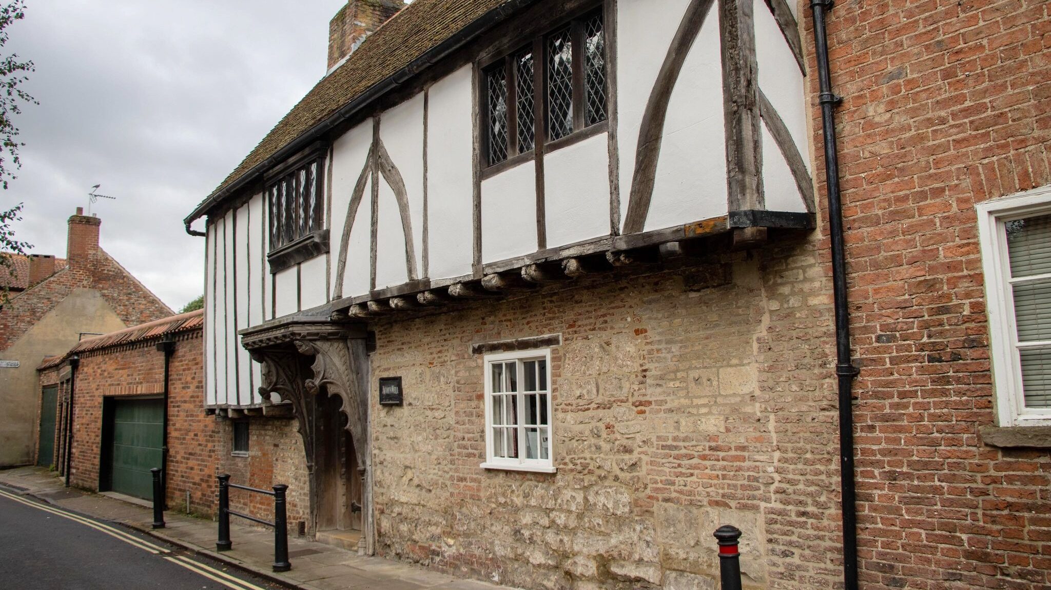 Medieval building on side of street.