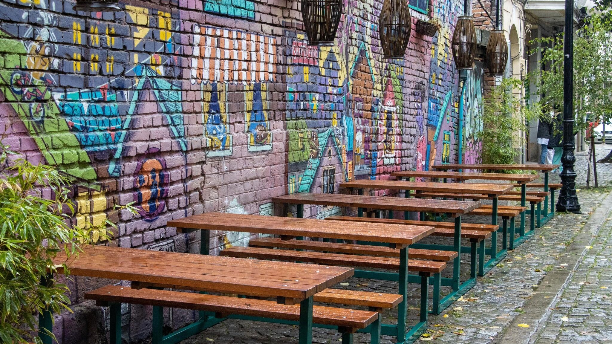 Street art next to benches.