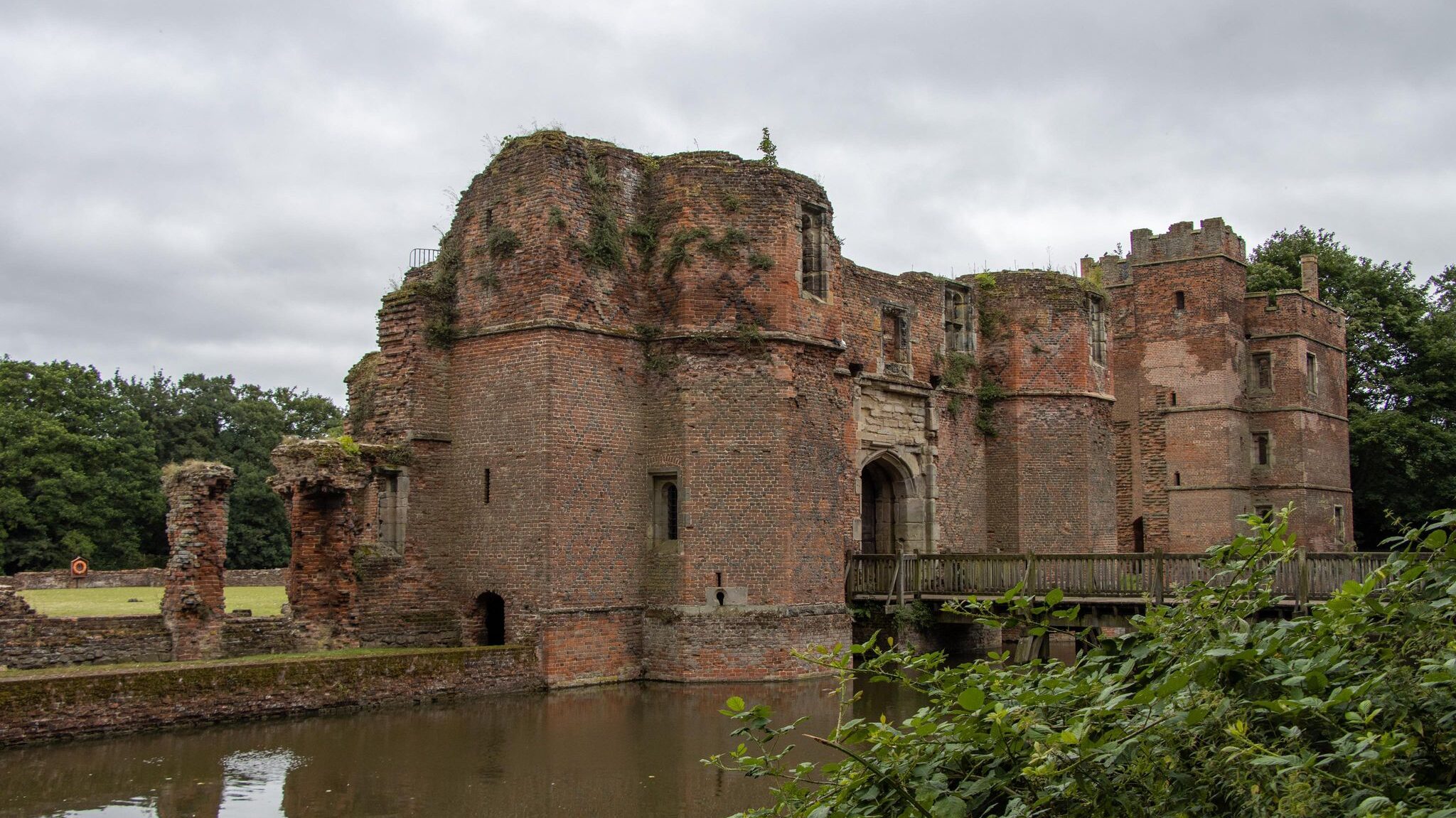 Medieval castle surrounded by moat. 