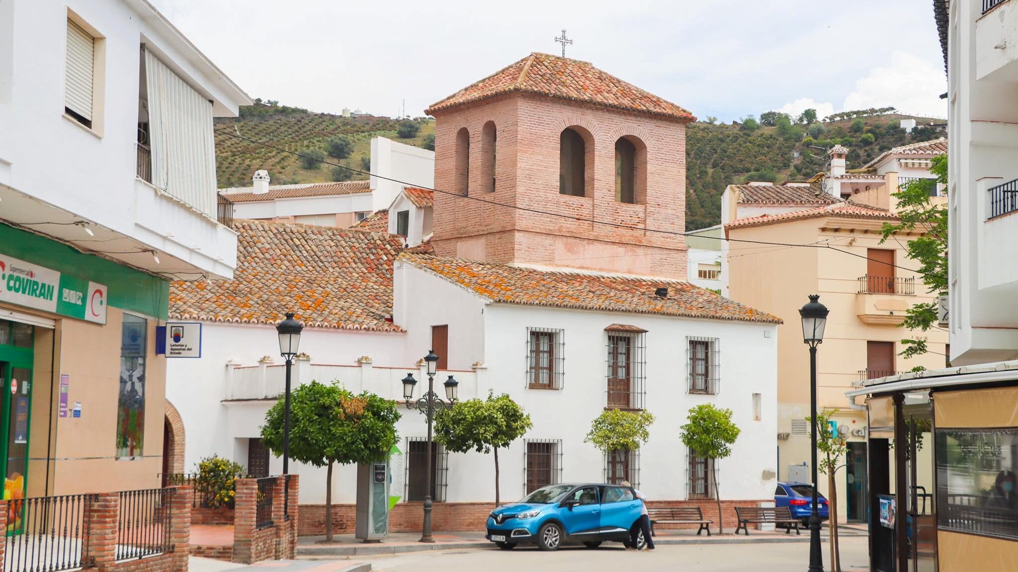 Small whitewashed and brick church things to see in Benamargosa.