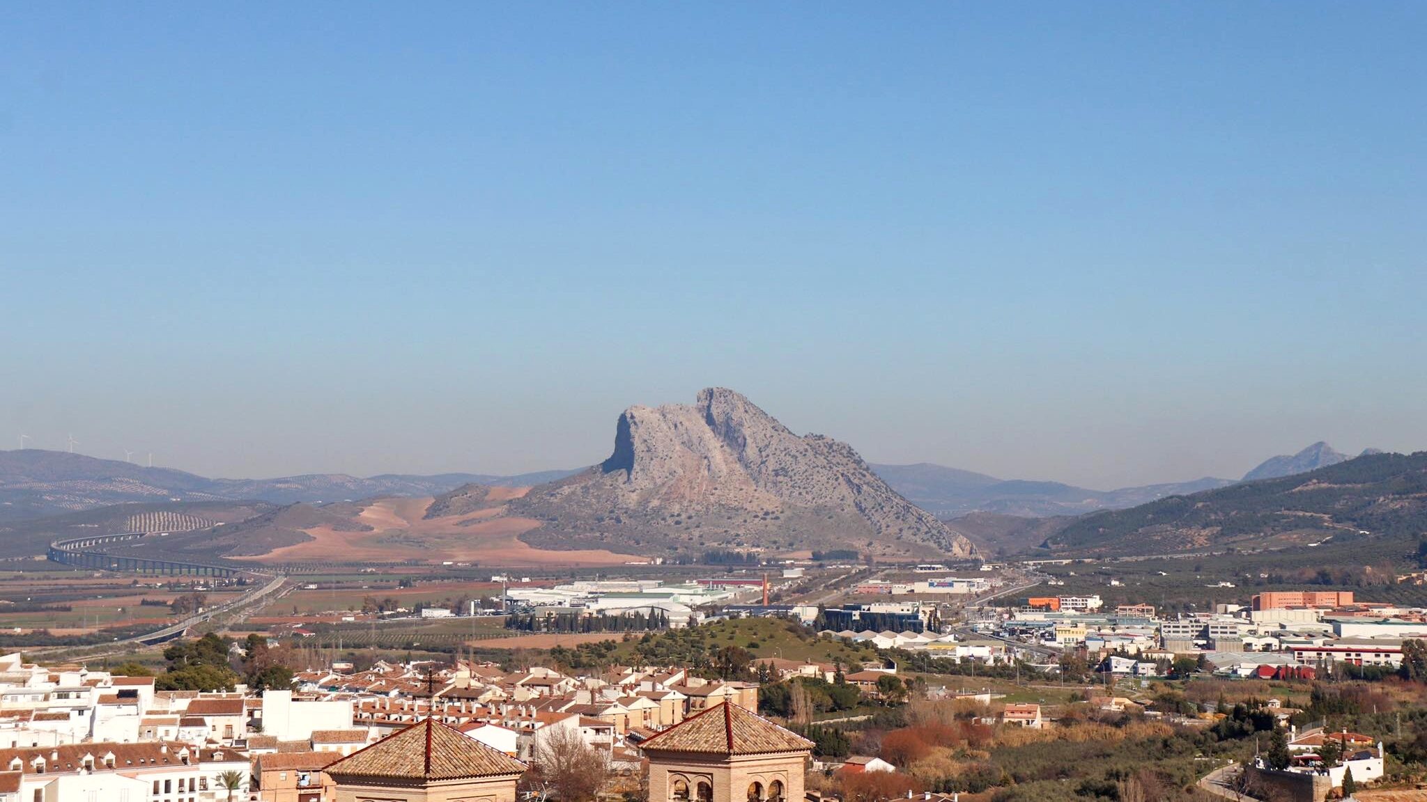 View of a mountain in the shape of a face.