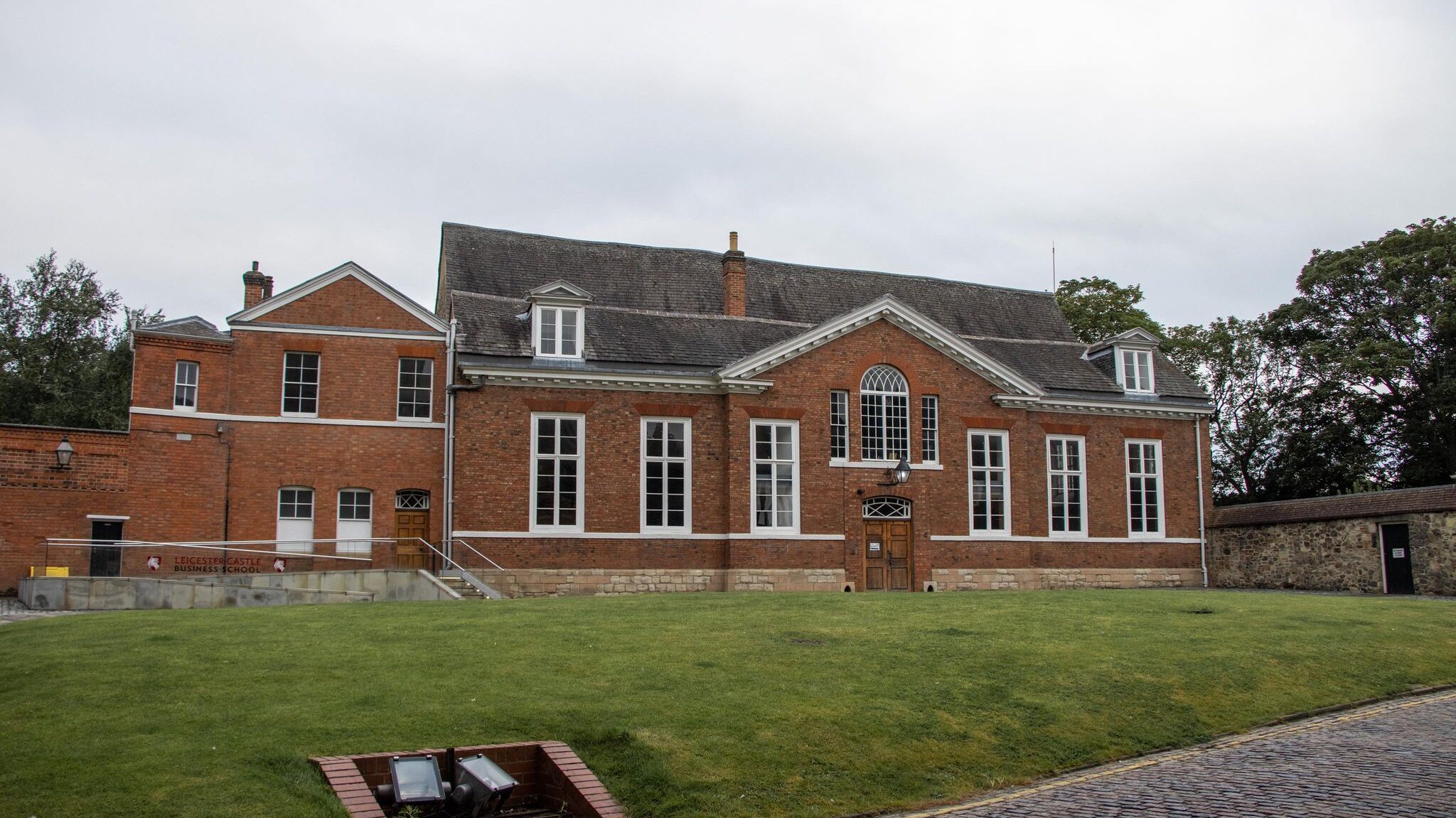 Brick building on the site of medieval castle. 