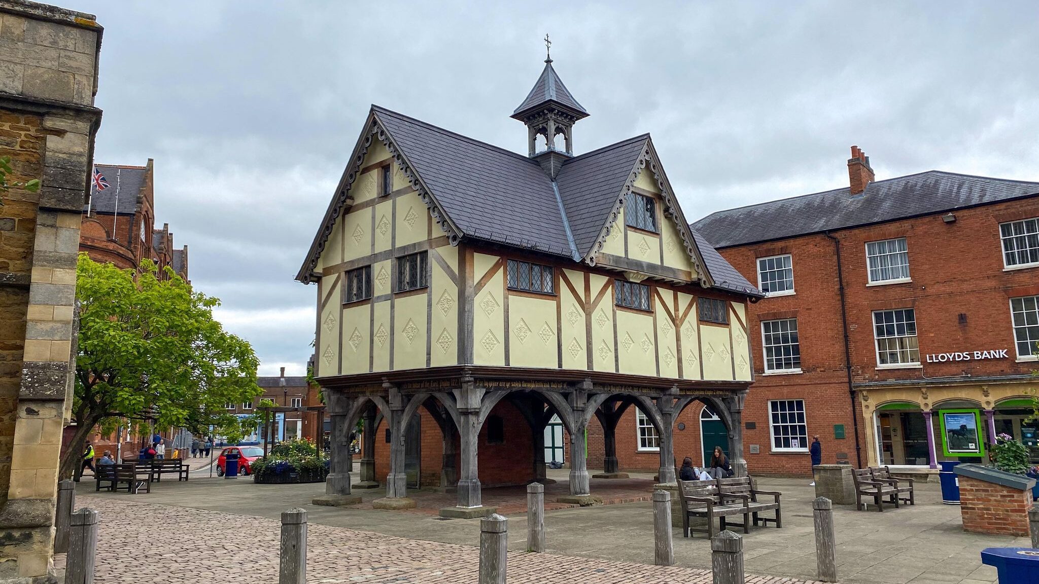 Small medieval building in town square.