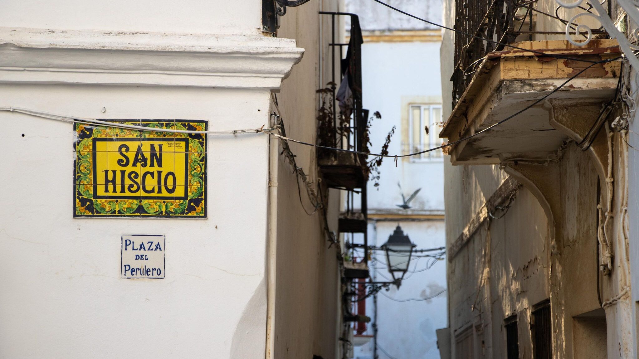 Tiled street sign in the old town of Tarifa.