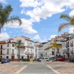 Open plaza next to church what to do in Alora.