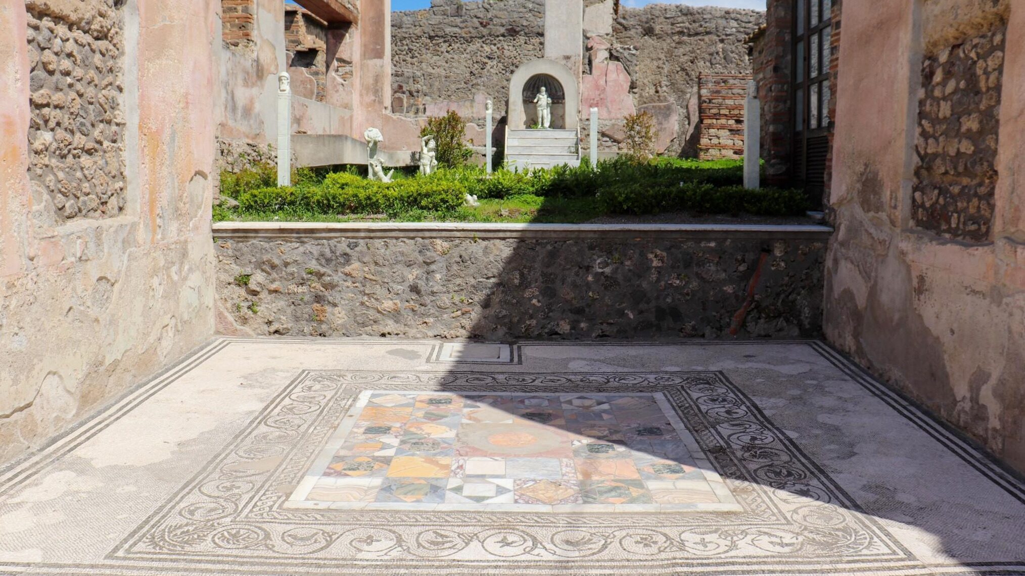 Large mosaic on the floor of villa in Pompeii.