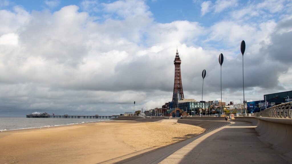 Beach in Blackpool with tower in the background.