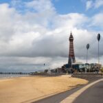 Beach in Blackpool with tower in the background.