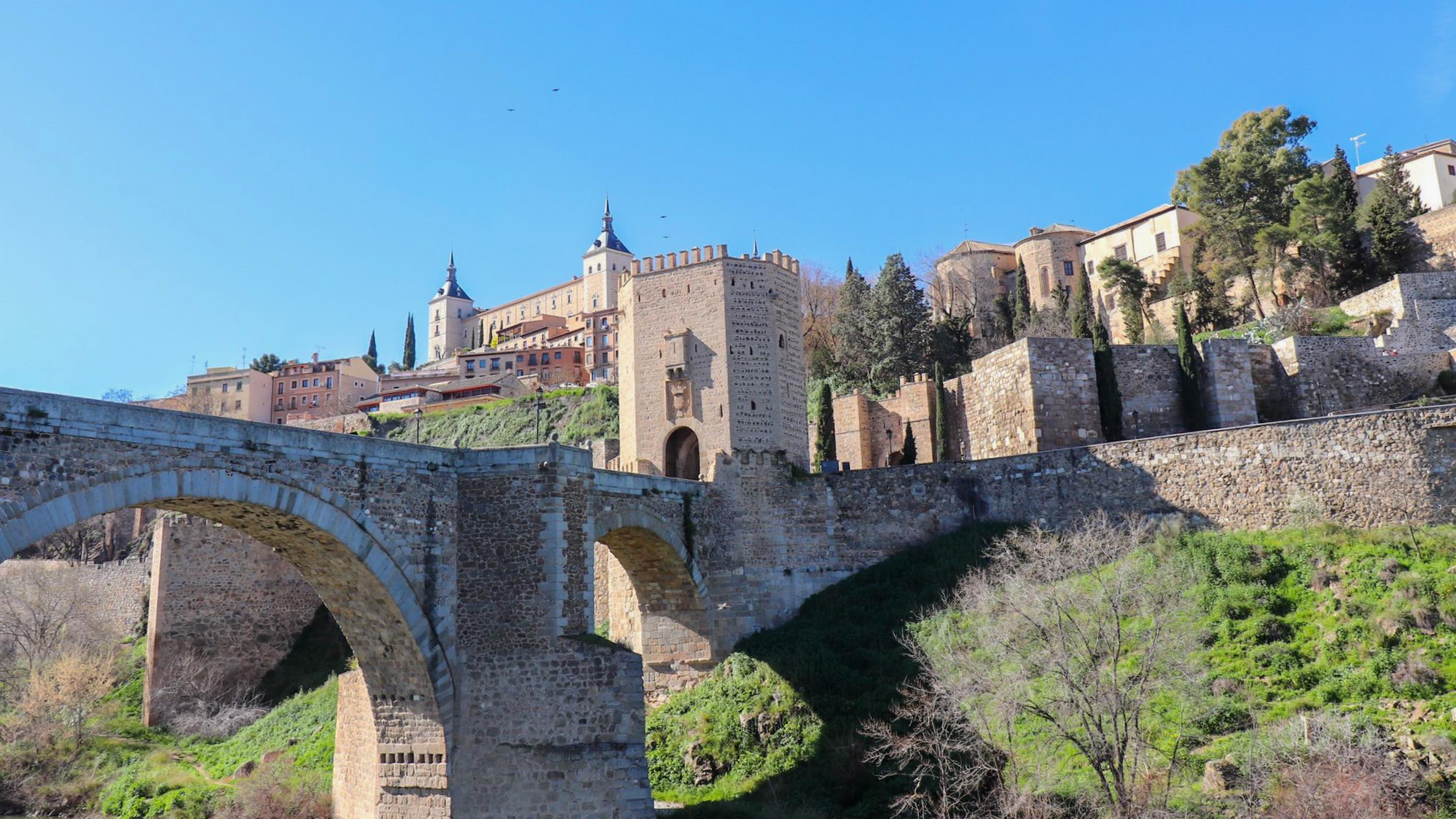 Medieval bridge crossing river in Toledo.