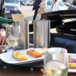 Wine and snacks served inside horse carriage one of the top experiences in Vienna.