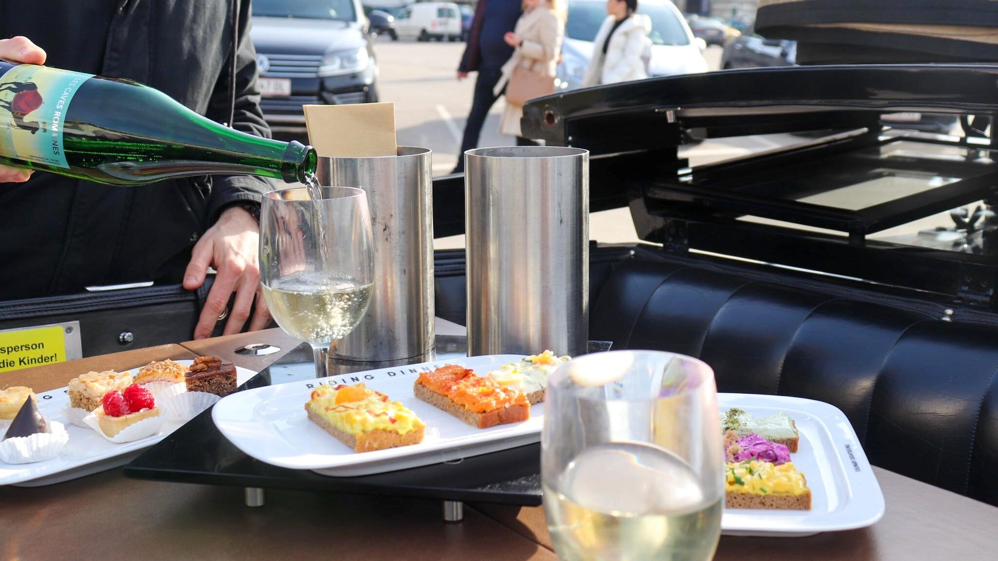 Wine and snacks served inside horse carriage one of the top experiences in Vienna.