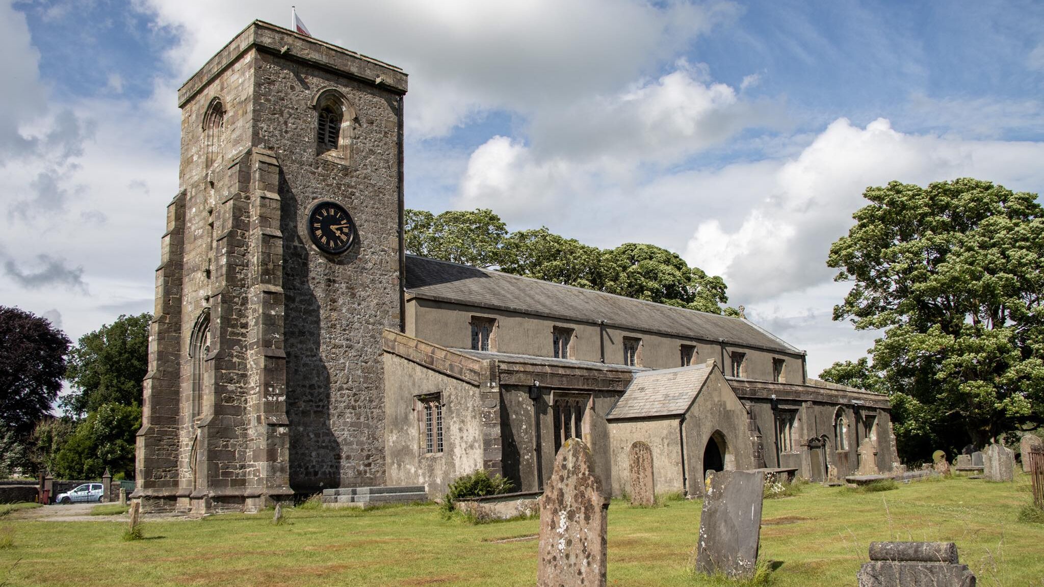 Medieval church with graveyard.