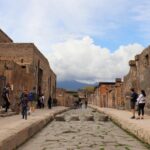 Street in Pompeii with stone road.