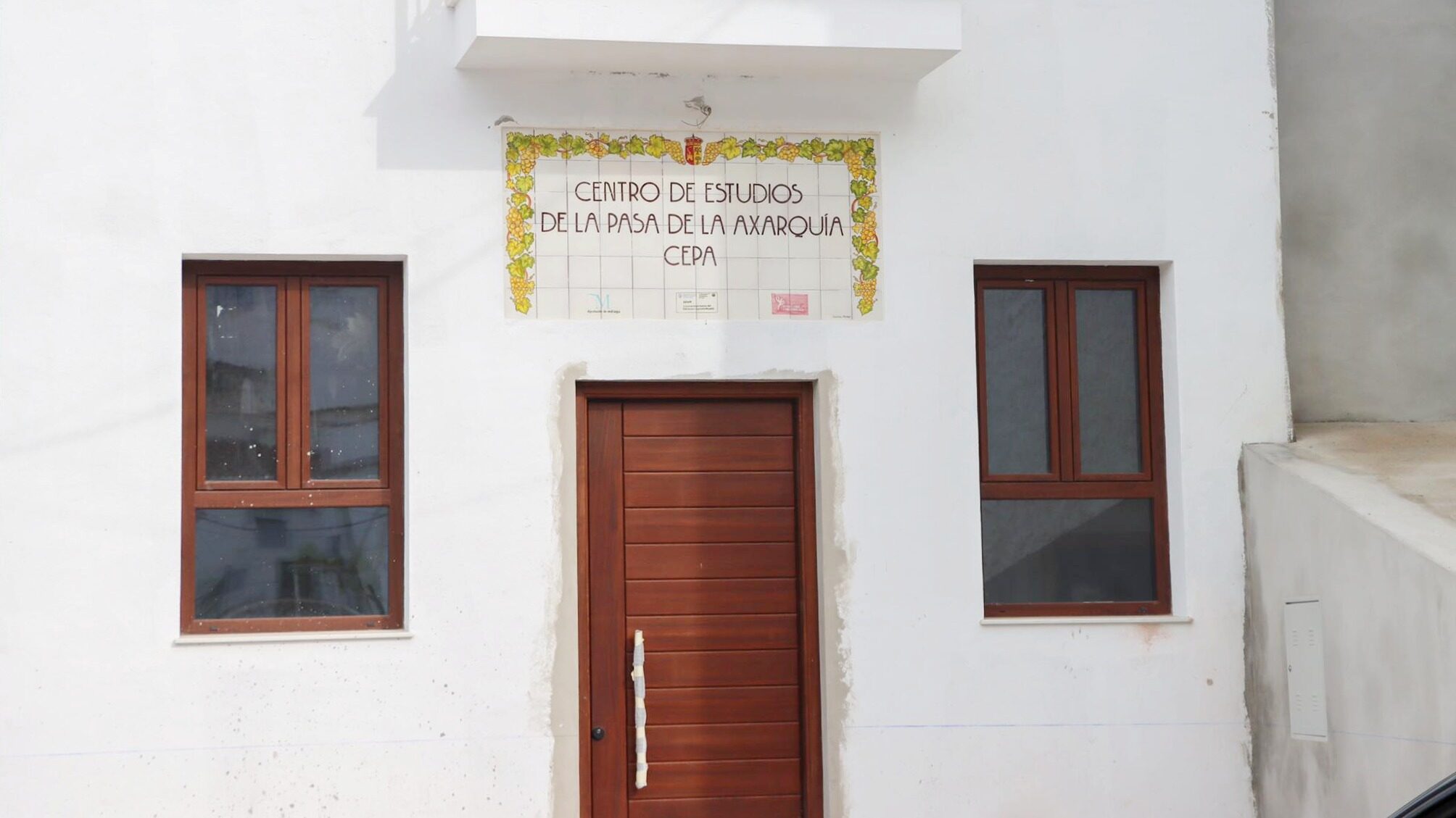 Wooden door leading to study centre.