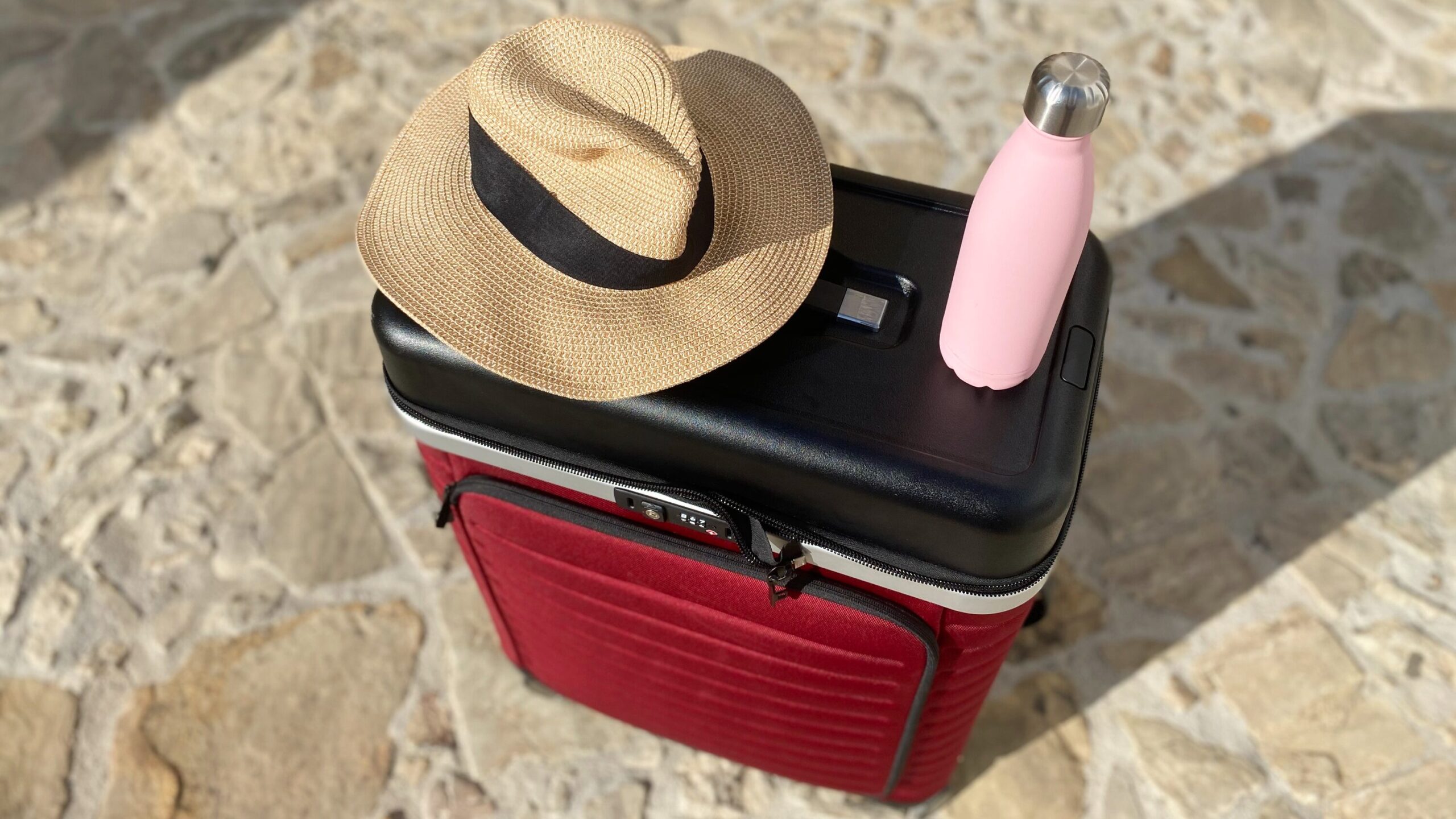 Top of suitcase being used as a table.