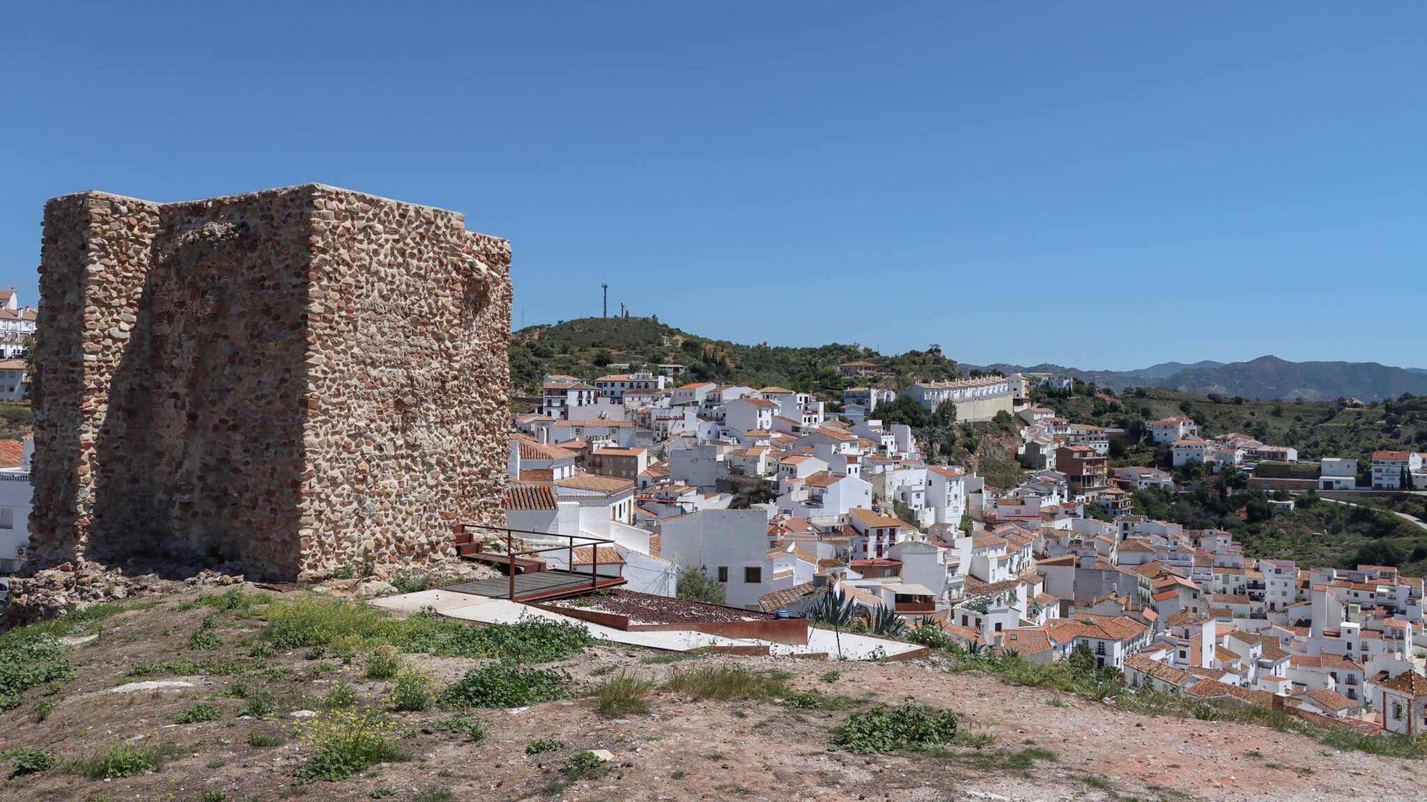 Ruins of medieval tower on hill in Almogia.