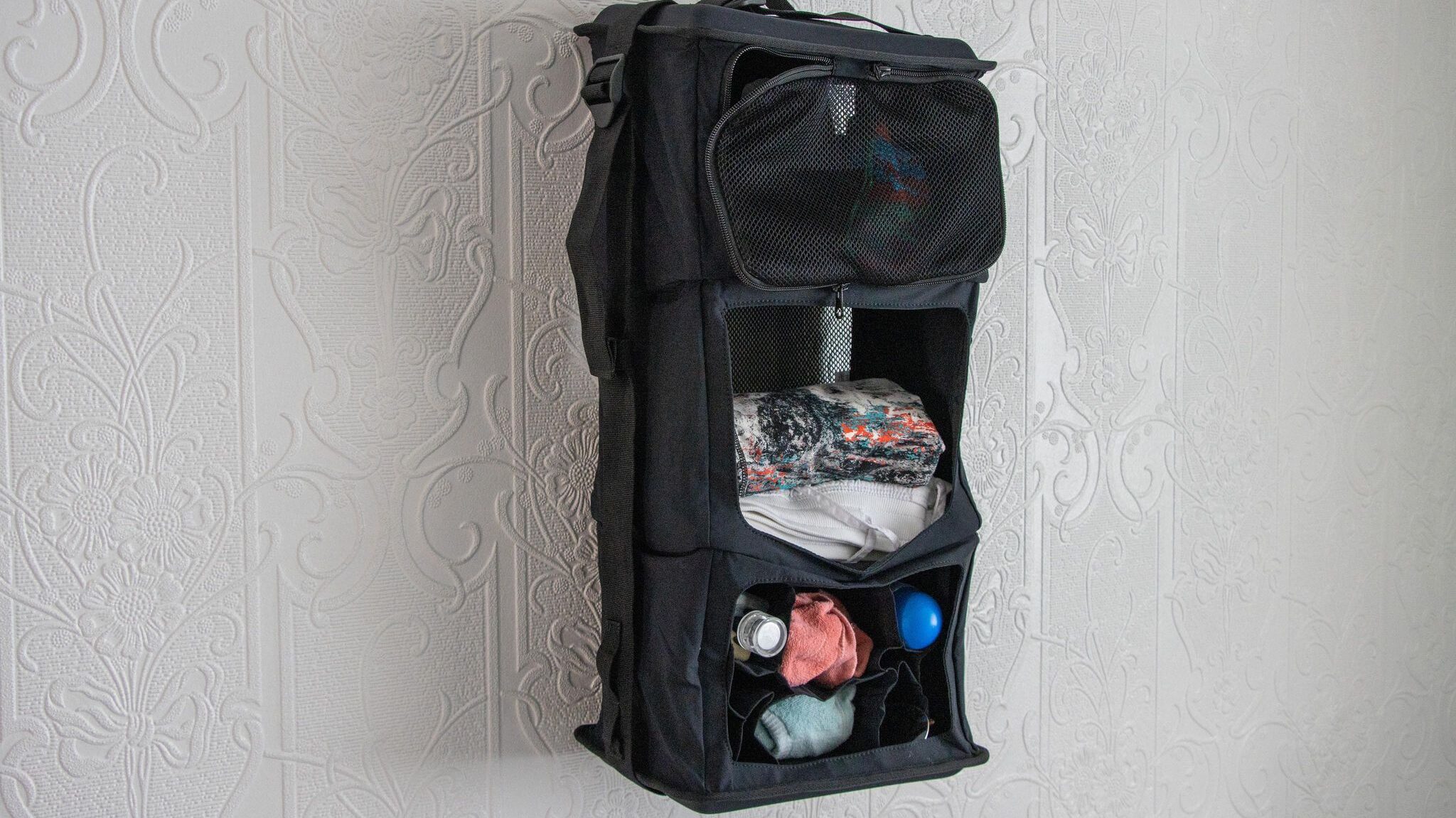 Black wardrobe system for Tropicfeel backpack.