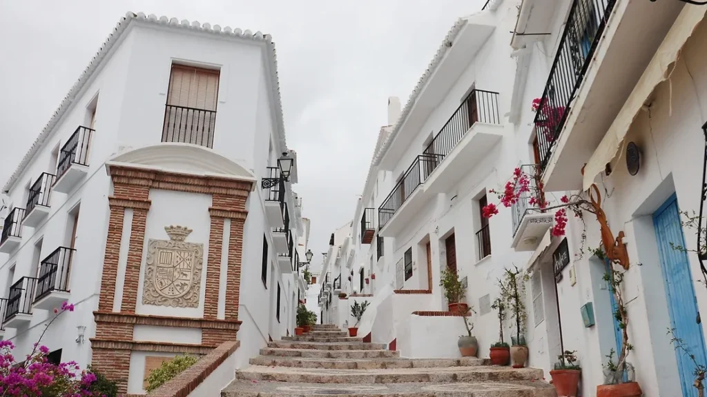 Steps leading up in white village.