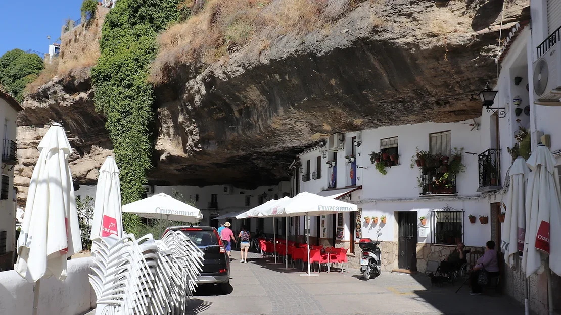 White village built into the rocks.