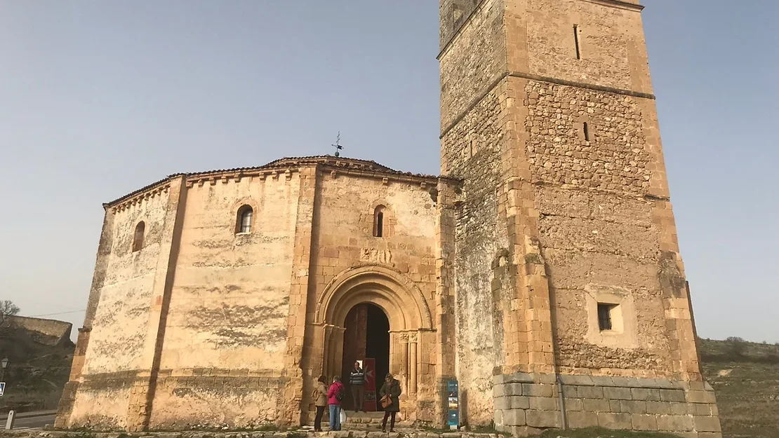 Medieval church with tall single tower.