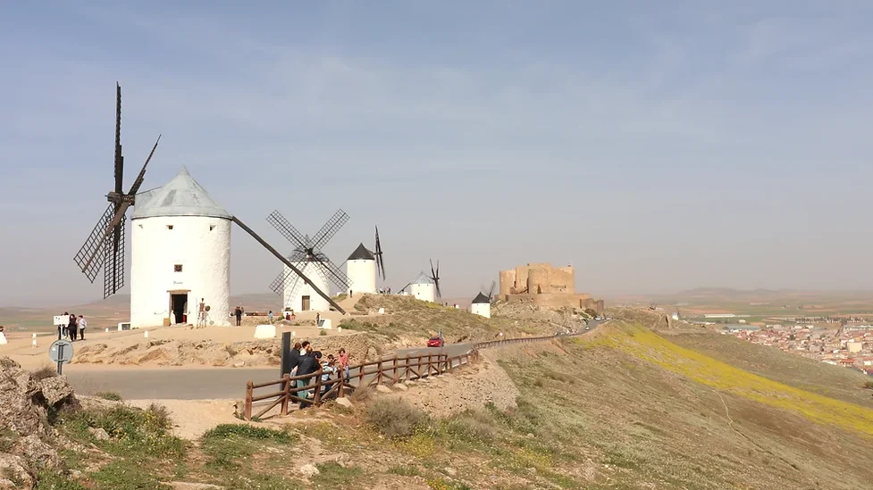 Line of windmills on a hill in Spain.